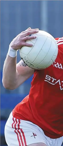  ??  ?? James Craven of Louth itake son Clare’s Eoin Cleary during their National Leagueclas­h in Cusack Park.