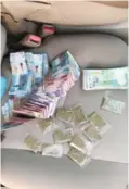  ??  ?? Drugs and cash found with the gang members.