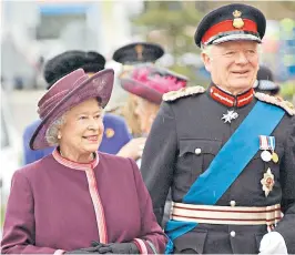  ??  ?? The Queen arriving with Sir Timothy at the new Norfolk and Norwich University Hospital in 2004