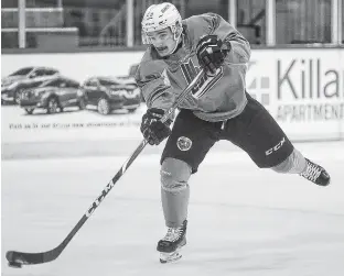  ?? JASON MALLOY/THE GUARDIAN ?? Cole Edwards takes a shot at Charlottet­own Islanders practice Thursday at the Eastlink Centre.