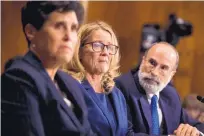  ?? TOM WILLIAMS/AP ?? Christine Blasey Ford testifies during the Senate Judiciary Committee hearing in Washington, D.C., on Thursday with her attorneys Debra Katz and Michael Bromwich.