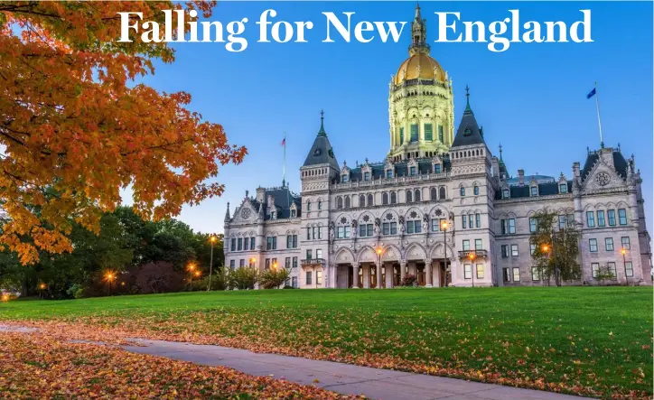  ??  ?? Autumn or Fall in New England is captured in all its rustic elegance outside the Connecticu­t State Capitol building in Hartford