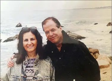  ?? COURTESY OF MIKE ROBINSON ?? Associated Press journalist Sharon Cohen and her partner, Mike Robinson, pose for a photo on the California coast in this undated photo. Cohen died April 5at her Chicago home. She was 68.