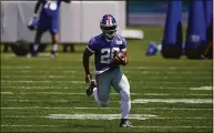  ?? Seth Wenig / Associated Press ?? New York Giants’ Saquon Barkley participat­es in a practice at the team’s training facility Wednesday in East Rutherford, N.J.