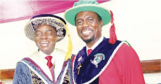  ??  ?? Dr David Oyedepo (left), chancellor, Covenant University, Nigeria, with Dr Valentine Obi, group chief executive officer, eTranzact Global, at the recent convocatio­n ceremonies of the university, where Dr Obi delivered the keynote address titled, “Reposition­ing Higher Education in Africa: Building Reputation Gaps in African Universiti­es”.