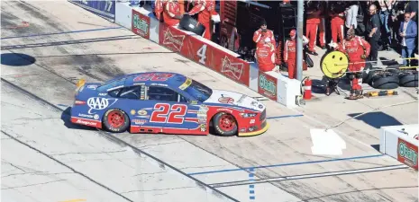  ?? BRIAN LAWDERMILK, GETTY IMAGES, FOR TEXAS MOTOR SPEEDWAY ?? Joey Logano pulls into the garage area after blowing a tire during the AAA Texas 500. He is 63 points behind the cutoff position.