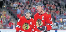  ?? CHRIS SWEDA / CHICAGO TRIBUNE ?? Patrick Kane, right, and Jonathan Toews were seemingly out of playoff contention, but the NHL’s expansion of the playoffs to 24 teams put the Blackhawks in as a No. 12 seed.