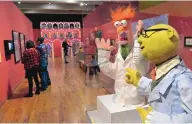 ??  ?? Beaker and Dr. Bunsen Honeydew puppets greet visitors at the Albuquerqu­e Museum’s Jim Henson exhibition. The exhibit runs through April 19.