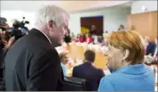  ?? (Photo AFP) ?? Angela Merkel trouvé un accord avec son ministre de l’Intérieur, Horst Seehofer, qui restreint la politique migratoire de l’Allemagne.