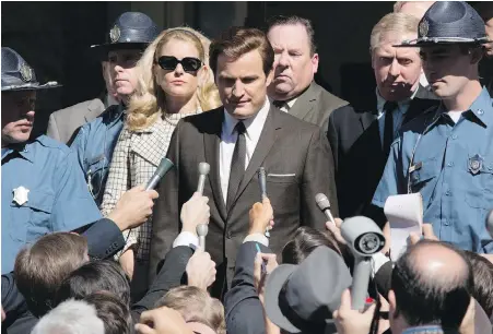  ?? ENTERTAINM­ENT STUDIOS ?? Jason Clarke as Ted Kennedy, centre, and Andria Blackman as Joan Kennedy in Chappaquid­dick.