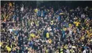  ??  ?? Fenerbahce fans celebrate after Elif Elmas scored the equaliser in their 1-1 draw against Galatasara­y at the ükrü Saracolu Stadium in April 2019. Photograph: NurPhoto/NurPhoto via Getty Images