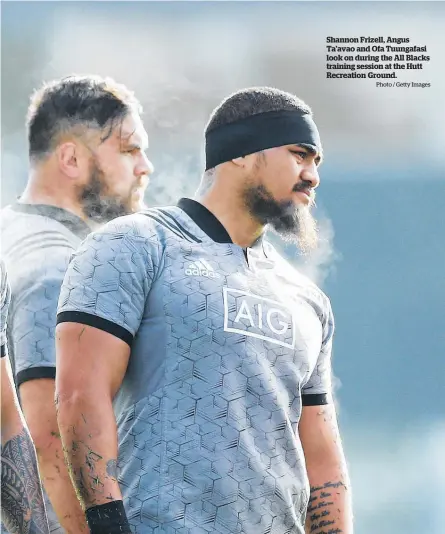  ?? Photo / Getty Images ?? Shannon Frizell, Angus Ta'avao and Ofa Tuungafasi look on during the All Blacks training session at the Hutt Recreation Ground.