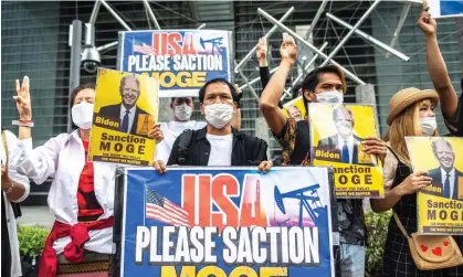  ?? ?? A group of activists call on the US government to sanction Moge in Tokyo, Japan. Photograph: Philip Fong/AFP/Getty Images