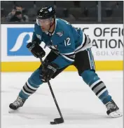  ?? NHAT V. MEYER — BAY AREA NEWS GROUP ?? San Jose Sharks' Patrick Marleau (12) controls the puck against the Vegas Golden Knights in the first period at the SAP Center in San Jose.