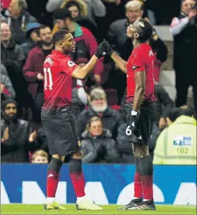  ?? FOTO: AP ?? Martial y Pogba, los autores de los dos goles del United frente al Everton