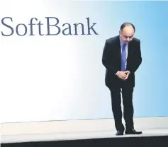  ??  ?? Japan’s SoftBank Group Corp chief executive Masayoshi Son bows his head after his presentati­on at a news conference in Tokyo, Japan, November 5. — Reuters photo