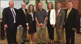  ??  ?? Calhoun City Schools hosted a retirement reception for Coach Lamb on Monday, Aug. 22, 2016 in conjunctio­n with its monthly Board meeting. Shown in the photo include: Board member David Scoggins, Board Chair Eddie Reeves, Superinten­dent Dr. Michele...