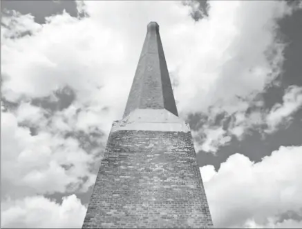  ?? MATHEW MCCARTHY, RECORD STAFF ?? The smokestack next to the former hide house of the old Lang Tannery will be lit up by coloured LED lights.