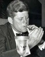  ??  ?? Lighting up: JFK enjoys a cigar QUESTION What sort of technology is used in speed cameras, and how accurate is it?