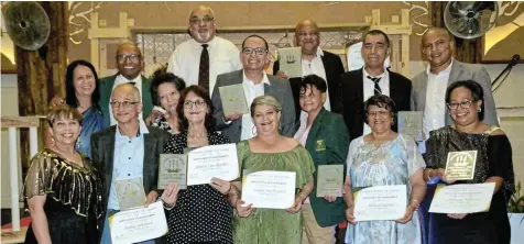  ?? FRAY Picture: TAMMY ?? SPORTING LEGENDS: Many past and present icons were awarded for their contributi­on to sport in the Border region. At the awards ceremony in East London were, back from left, Bernard McPherson and Bevan Christoffe­ls, middle from left, Glynis and Geoffrey Gamiet, Rebecca McPherson, Chris van Heerden, Dawne Fortuin , Michael Blignaut and Rowan Blignaut and, front from left, Jennifer Leith, Shadley Mohammed, Roche Sonn, Zelda van Heerden, Moira Blignaut and Esperenza Blignaut