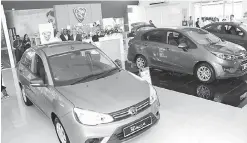  ??  ?? NAIK TARAF: Keadaan ruang pameran di Pusat 3S Proton, KH Motor Kota Samarahan.