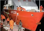  ?? Photo: VCG ?? Members of National Search and Rescue Agency prepare for a search mission in Bali, Indonesia on Wednesday.