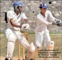  ??  ?? Lahiru Madusanka of Piliyandal­a cuts against St. Thomas’ Matale - Pic by Ranjith Perera