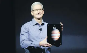  ??  ?? Apple CEO Tim Cook introduces the new iPad Pro with 13-inch screen.