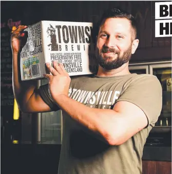  ?? Picture: ALIX SWEENEY ?? BREW TO YOU: Townsville Brewery head brewer Sam Lloyd loads up to deliver beer to households while the coronaviru­s social gathering rules are in place.