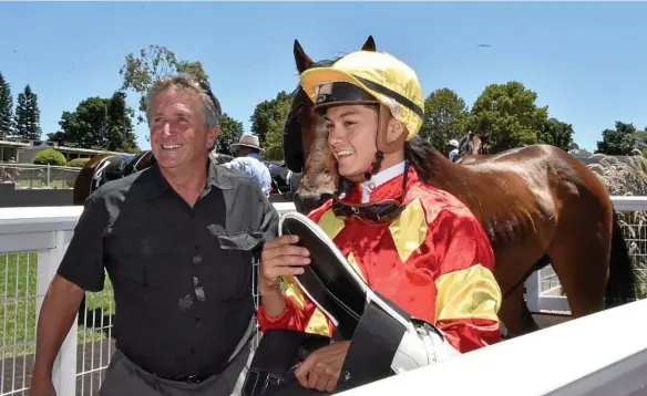  ?? PHOTO: BEV LACEY ?? WINNING SMILES: Trainer Garry Schwenke and apprentice Michael Murphy celebrate Nonchalant­e’s Clifford Park maiden victory yesterday.