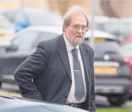  ??  ?? Liberal Democrat councillor Richard Moore arrives at the hearing in Forfar yesterday.