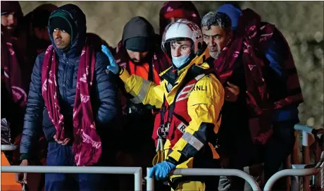  ?? Picture: Gareth Fuller ?? A group of people thought to be migrants are brought into Dover, Kent, by the RNLI, following a small boat incident in the English Channel after 27 people died yesterday in the worst-recorded migrant tragedy in the area