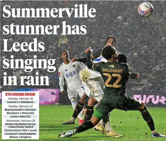  ?? REX ?? Don’t lob me this way: Summervill­e admires his wonderful finish to put Leeds 2-1 up in the first half of extra time