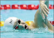  ??  ?? In this July 25, 2019 file photo, China’s Sun Yang swims during a warm up session at the World Swimming Championsh­ips in Gwangju, South Korea. Chinese swimmer star Sun Yang has been banned for more than four years for breaking anti-doping rules. (AP)