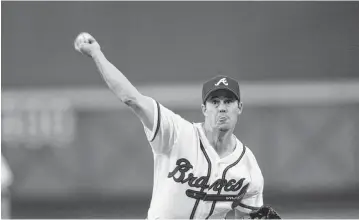  ?? JAMIE SQUIRE Getty Images/TNS ?? Former Braves pitcher Greg Maddux, seen in 2002, believes pitchers today are encouraged too much to go for velocity rather than location.