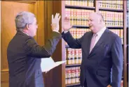  ?? San Francisco city attorney’s office ?? Kevin Ryan (right) is sworn in to the Ethics Commission by S.F. City Attorney Dennis Herrera.