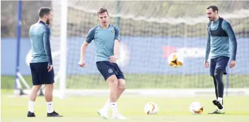  ??  ?? (From left) Chelsea’s Eden Hazard, Cesar Azpilicuet­a and Gonzalo Higuain during training at Cobham Training Centre in Cobham, Britain. — Reuters photo