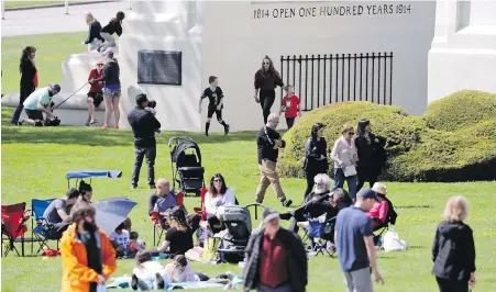  ?? THE ASSOCIATED PRESS ?? The American side of Peace Arch Park, in Blaine, Washington, is staying open while the Canadian side is closing.