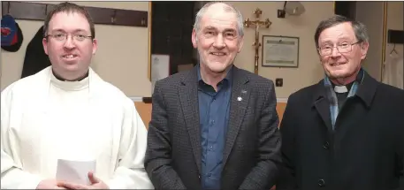  ??  ?? Fr. Barry Matthews and Archdeacon Jim Carroll with Mickey Harte in Our Lady of Lourdes church on Sunday.