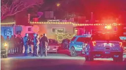  ?? ROBERTO E. ROSALES/JOURNAL ?? Police investigat­e after an officer shot and killed an armed robbery suspect in a backyard after a chase through a northeast Albuquerqu­e neighborho­od.