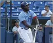  ?? JOE BOJC — FOR THE NEWS-HERALD ?? Jhonkensy Noel watches his home run in the Captains game against Dayton.