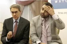  ?? — AFP photo ?? Roth (left) and Omar Shakir speak during an interview at an east Jerusalem hotel, ahead of Shakir’s expulsion from Israel.