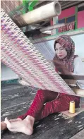  ?? ?? Ruhina not only keeps the tradition of weaving in her hometown in Maimbung, Sulu, but also empowers the local economy where she lives.