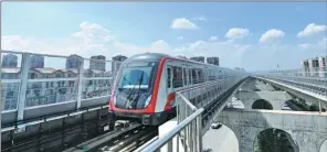  ??  ?? Kunming’s Metro trains now handle 470,000 passengers a day, on average. The city is constructi­ng a communicat­ion and transporta­tion network to connect Southeast Asia and South Asia.