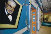  ?? STEVEN SENNE — THE ASSOCIATED PRESS FILE ?? A mural that features Theodor Seuss Geisel, left, also known by his pen name Dr. Seuss, covers part of a wall near an entrance at The Amazing World of Dr. Seuss Museum in Springfiel­d, Mass.