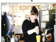  ??  ?? Deidre Mays, owner of Magnolia Coffee along with her husband Richard, fills an order in February 2018. The couple has decided to close its Prairie Grove and Farmington shops for the time being because of the coronaviru­s.
(File photo/NWA Democrat-Gazette)