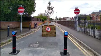  ??  ?? The cycle route in Station Road, Newbury, in the first phase of temporary active travel measures