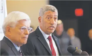  ?? MEG POTTER/THE LAS CRUCES SUN-NEWS ?? New Mexico State athletic director Mario Moccia, right, and Chancellor Dan Arvizu answer questions about the hazing allegation­s against the basketball team on Feb. 14 in Las Cruces.