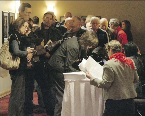  ?? PHOTOS: CHRIS SCHWARZ/FILE ?? Investors line up to register for the first meeting of creditors in the bankruptcy of Jay Peers’s Federal Mortgage Corporatio­n Ltd. in 2011. In the aftermath of the bankruptcy, many creditors are receiving just pennies on the dollar for their...