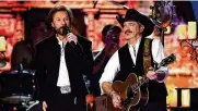  ?? PHOTO BY ETHAN MILLER/GETTY IMAGES FOR DCP ?? Ronnie Dunn (left) and Kix Brooks of Brooks & Dunn will perform June 16 at Nationwide Arena.